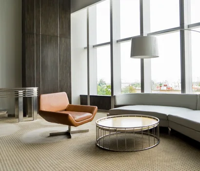 Quiet contemporary interior with layered materials and soft daylight